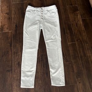 Light wash button fly jeans
